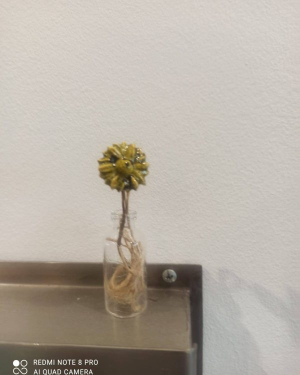 Petite fleur en fiole